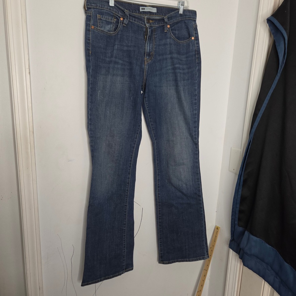 Levis 515 Boot Cut Jeans Womens 12 L Medium Wash Blue Denim Mid Rise Flap Pocket